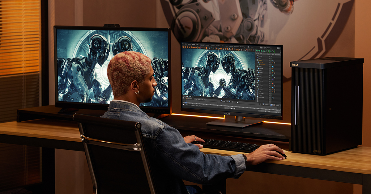 A man sitting on a chair while holding a ProArt mouse and typing on a keyboard with an external ASUS ProArt monitor on the left side and in the middle, and an ASUS ProArt station computer on the right side of the desk.