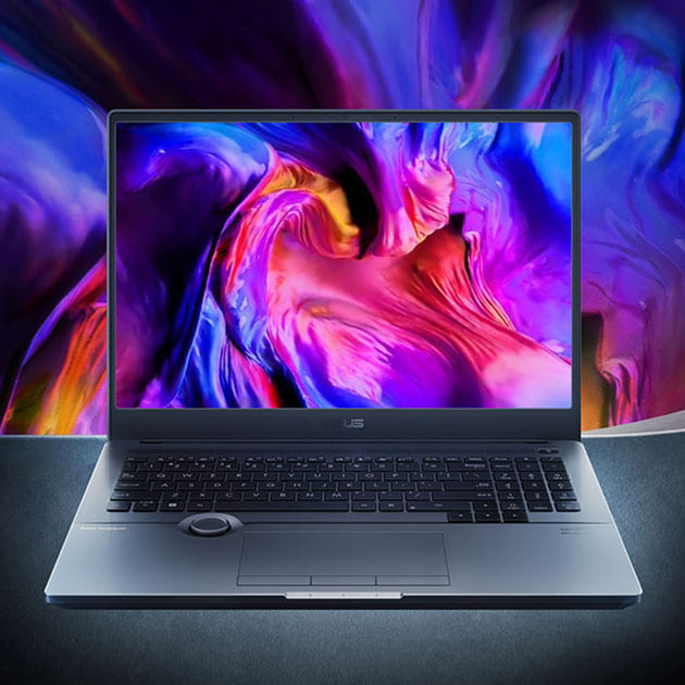 ASUS ProArt Studiobook 16 OLED creator laptop with a colorful background matching the modern background