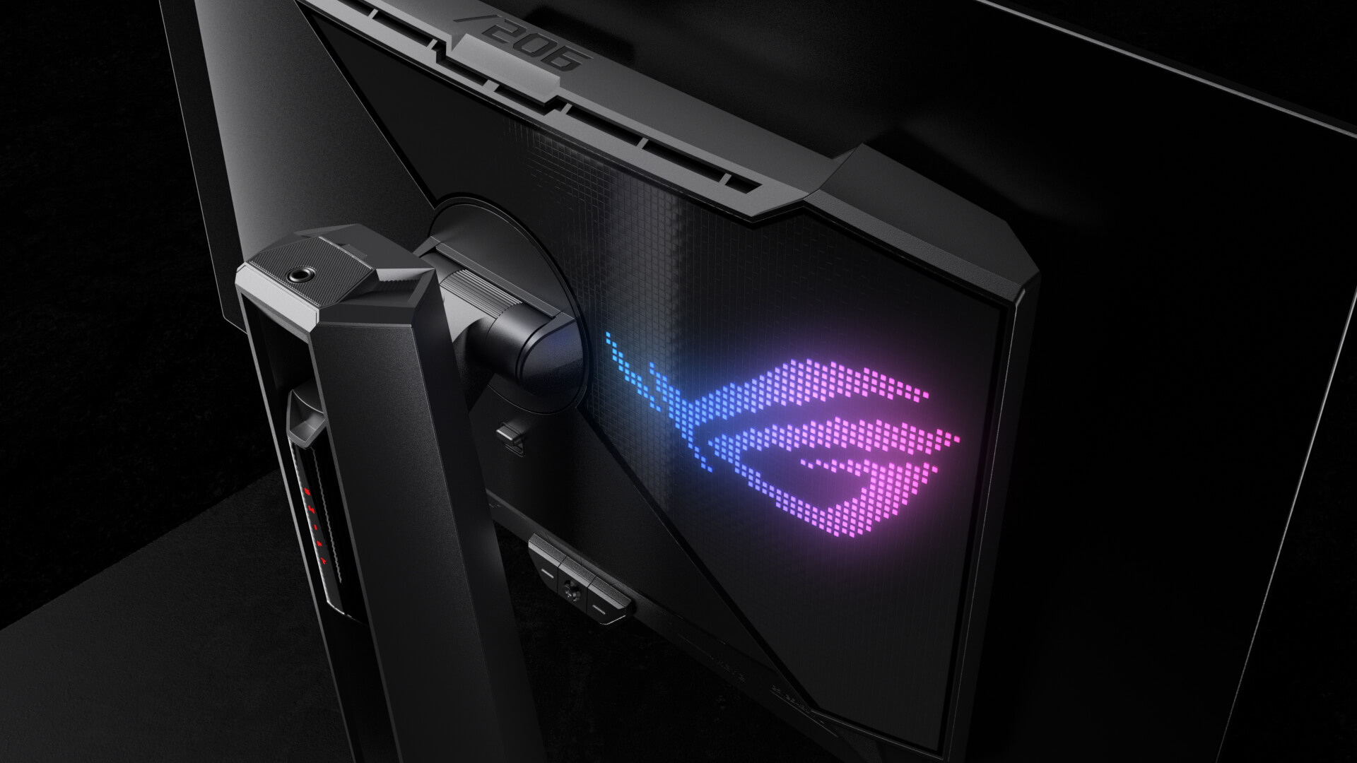 The rear panel of PG27AQDM has a futuristic, cyberpunk-inspired aesthetic.