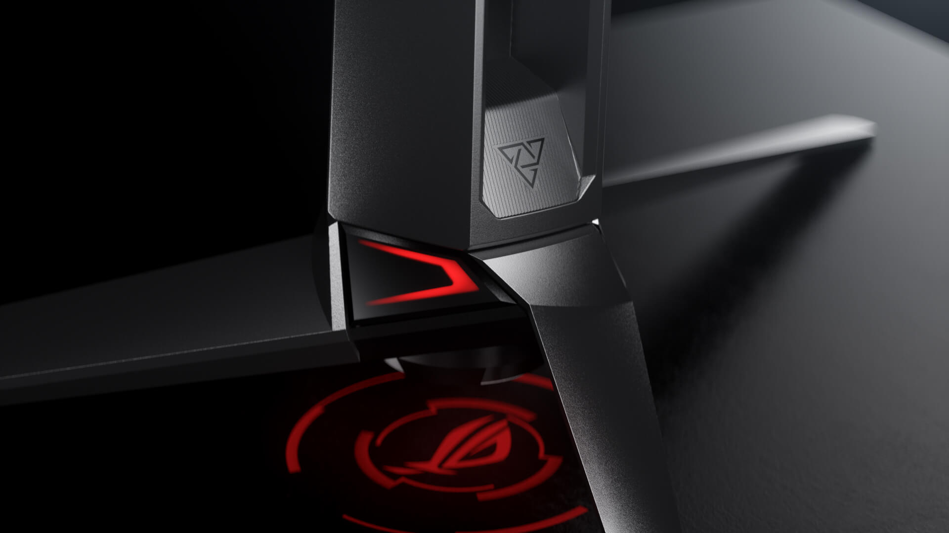 The ROG logo projection under the PG27AQDM.