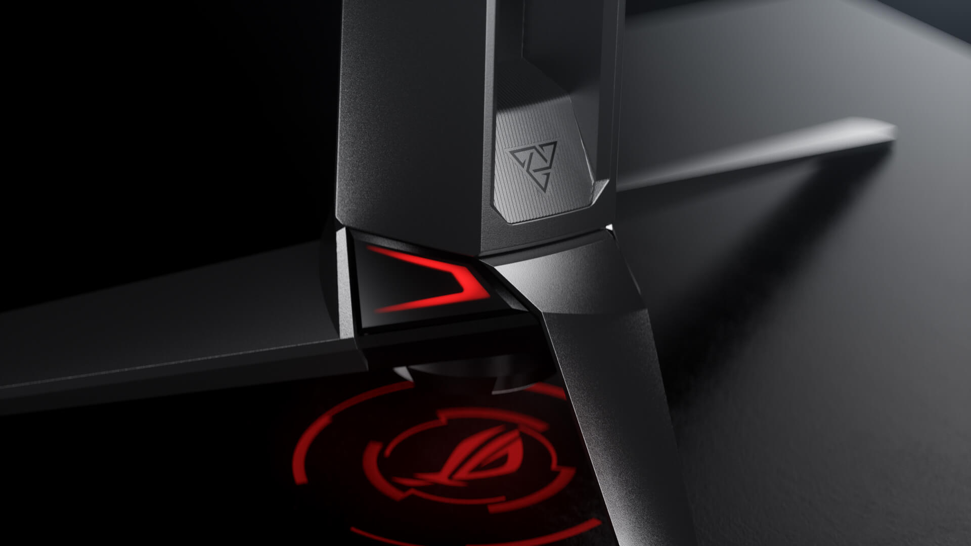 La projection du logo ROG sous le PG27AQDM.