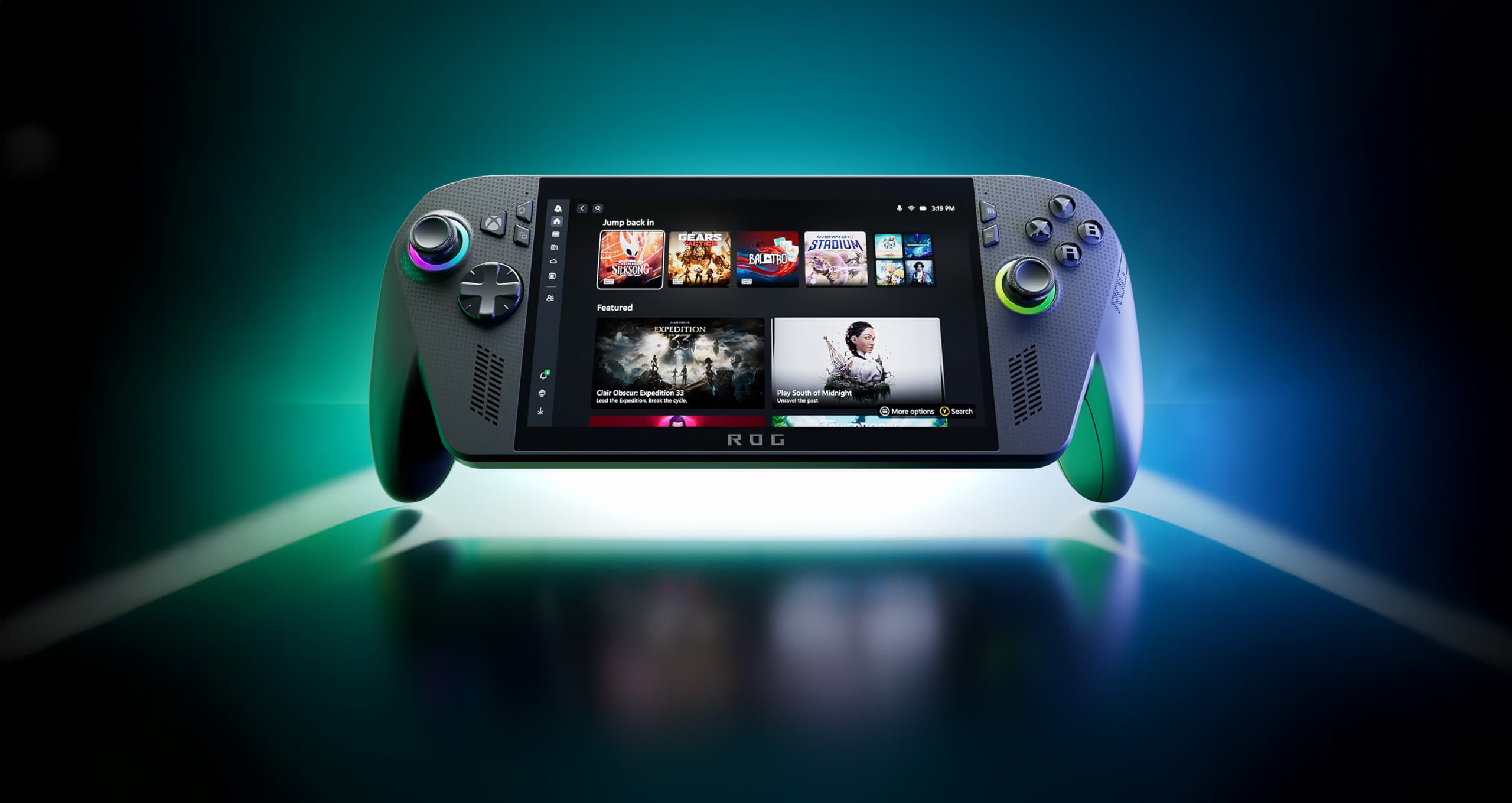 Front view of the ROG Xbox Ally X gaming console, showcasing the software UI interface on its screen with aura lighting on joysticks.
