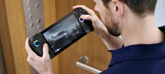 A man playing an ROG Xbox Ally X inside a wooden lined elevator.