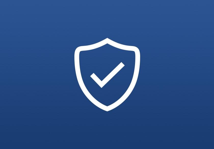 White shield icon with a checkmark inside on a blue circular background