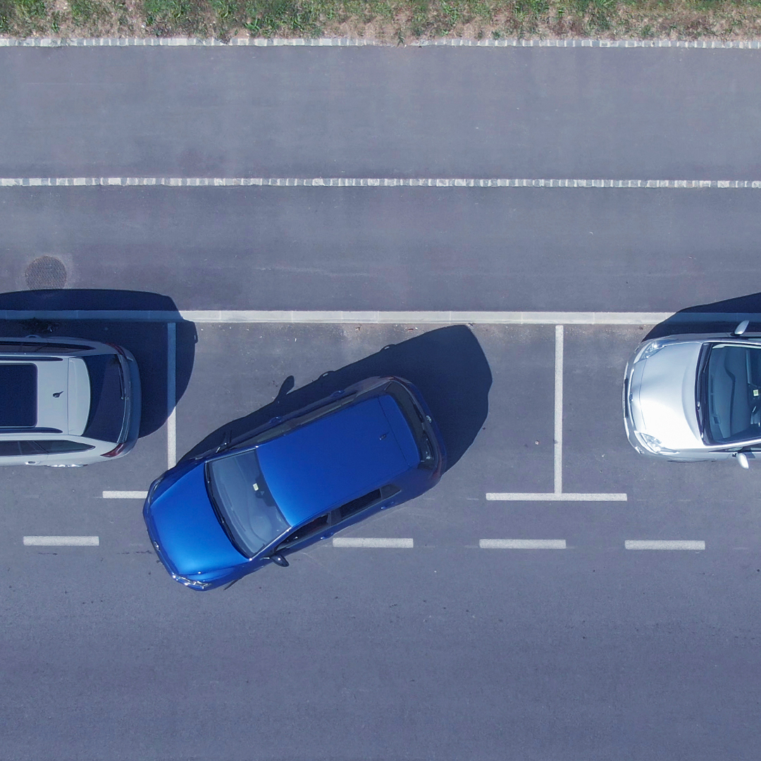 A car parking by the street