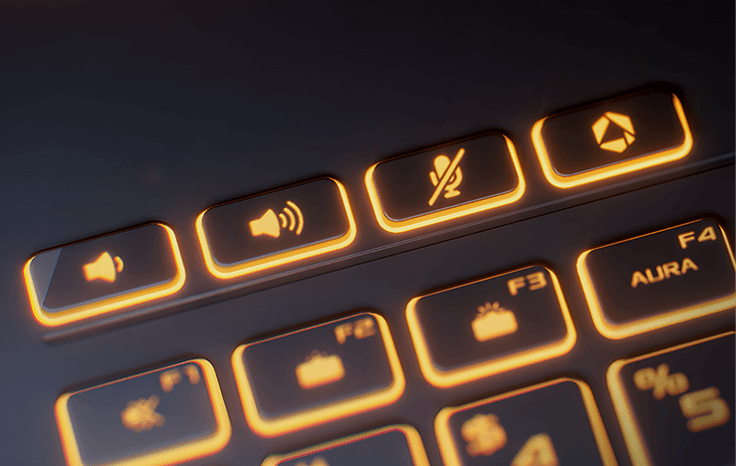 An extreme close up of the three volume control keys and one Armoury Crate key.