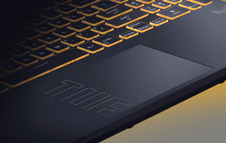 Крупным планом показана нижняя часть клавиатуры и тачпад ноутбука TUF Gaming F16. На тачпаде виден логотип TUF.