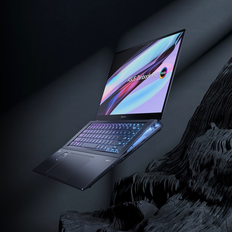 Zenbook Pro 16X OLED opened with 120 degrees tilted on the surface of dark rock