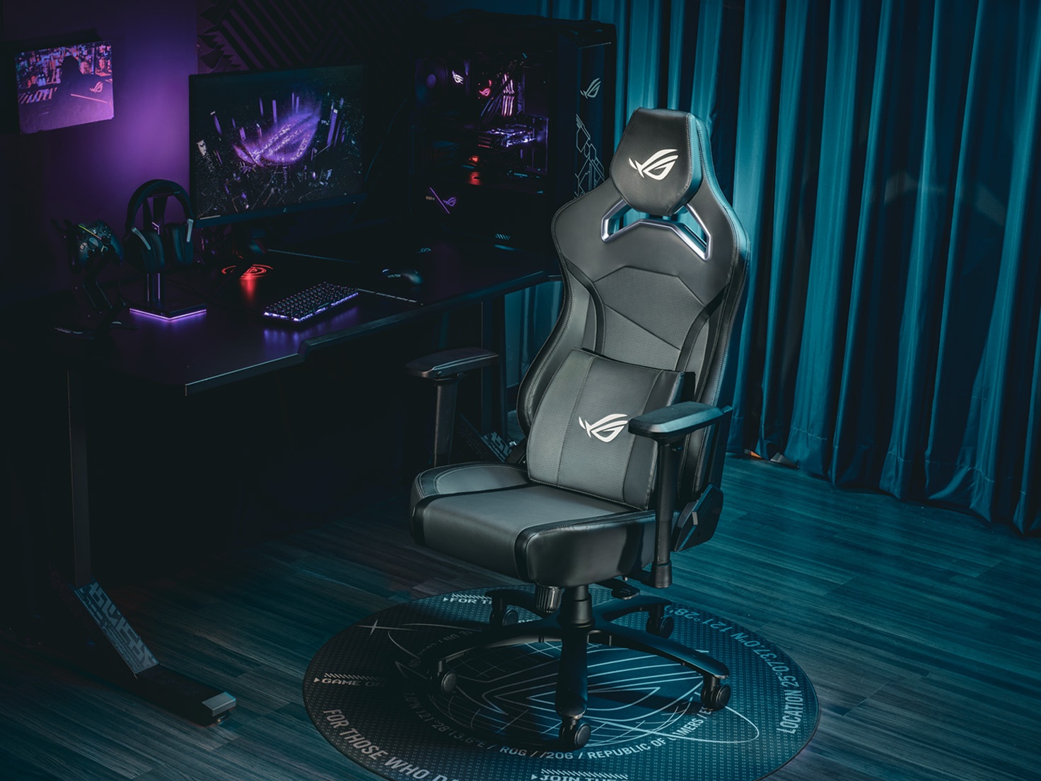 ROG Chariot X gaming chair front view to the left in a gaming room setting