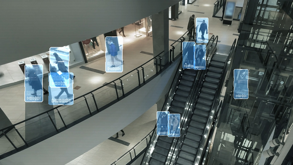 At parking lot, there are four EV charging stations and four cars.