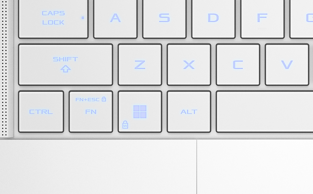 Gros plan sur le clavier du Zephyrus G16, technologie Tri-Fan, en particulier sur les touches fléchées.