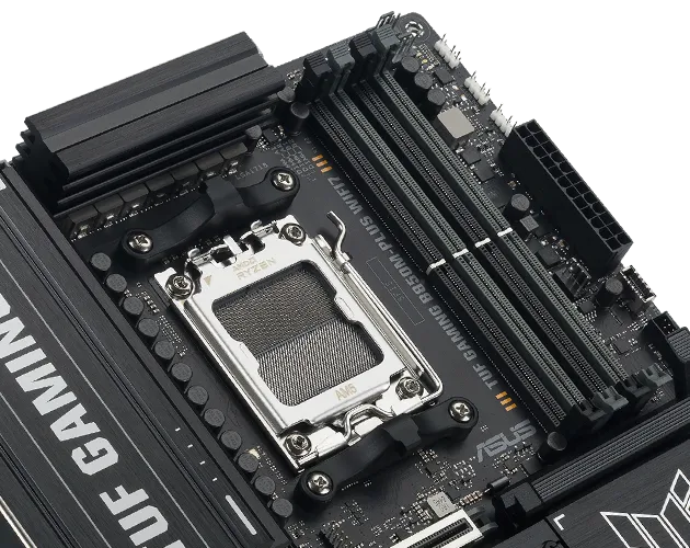 Close-up of TUF GAMING B850M-PLUS WIFI7 showing DDR5 memory slots with a label indicating support for DDR5 modules up to 8000+ MHz.