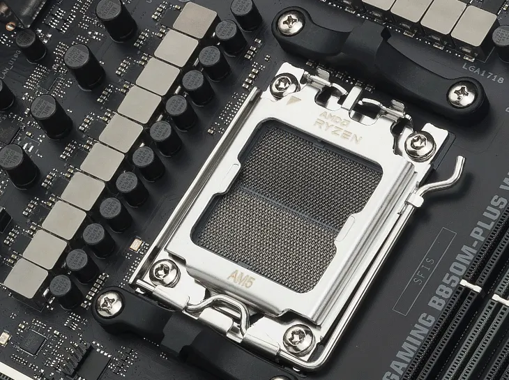 Close-up of an AM5 CPU socket on TUF GAMING B850M-PLUS II.