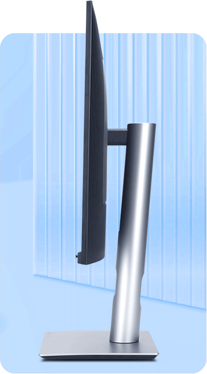 A sleek, side-profile view of a ProArt monitor with a thin, frameless design. The setting is minimalistic and modern.