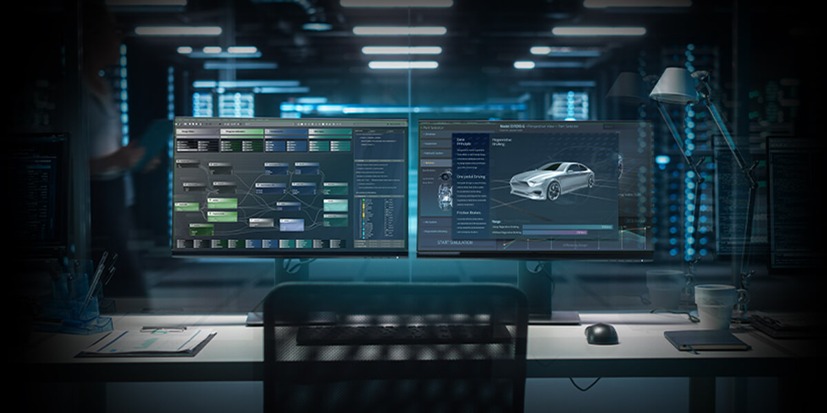 A multi-monitor workstation showing multiple applications and data visualizations.