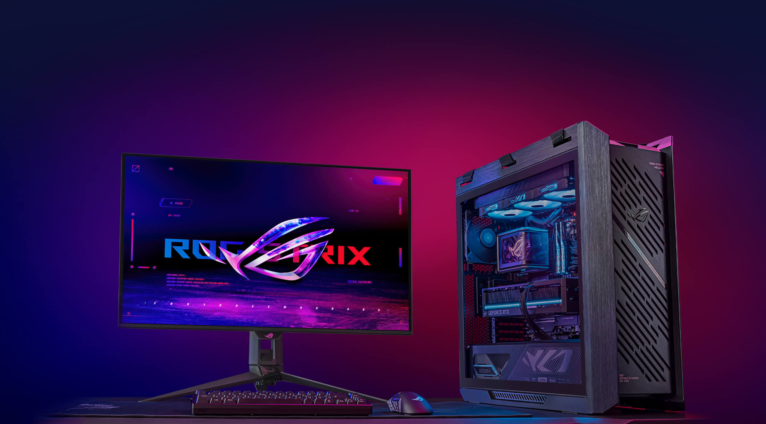 High-end gaming setup with RGB Helios II PC, monitor showing ROG logo and neo background, and matching RGB peripherals.