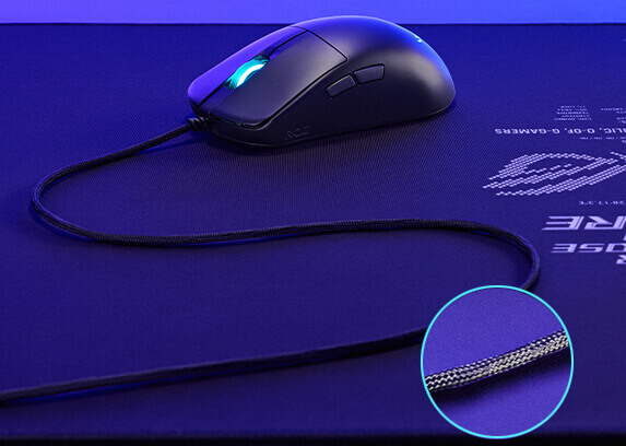 The ROG Harpe Mini Core placed on a Sheath II XXL mouse pad and a highlight on its paracord