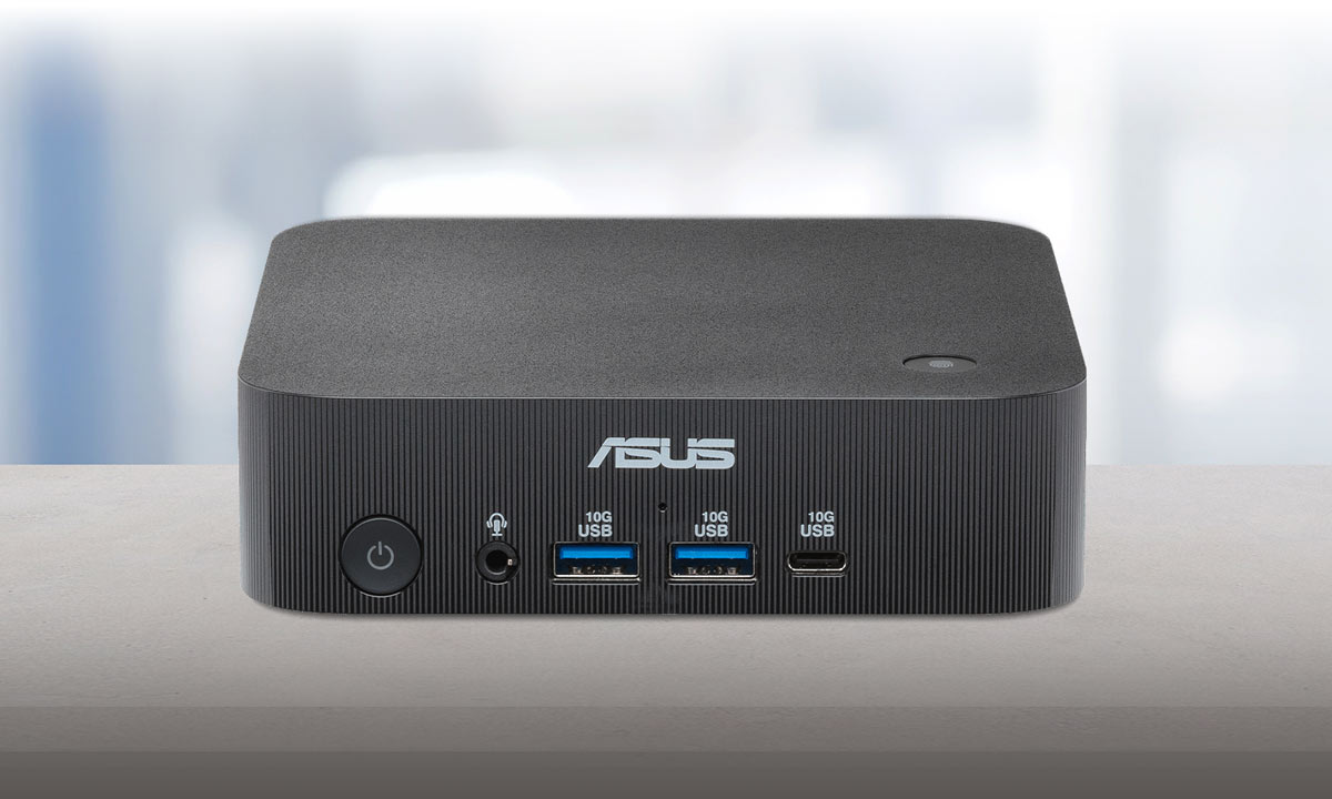 Best mini PC for business ASUS ExpertCenter PN54-S1 Mini PC on a concrete table against modern city view