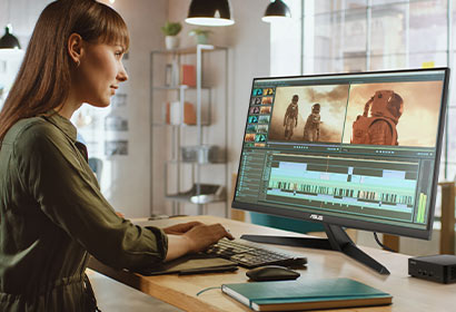 Person editing video footage using best mini PC for media editing ExpertCenter PN54-S1 Mini PC