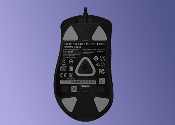 Bottom view of the ROG Gladius III Core mouse, with its four pieces of mouse feet highlighted