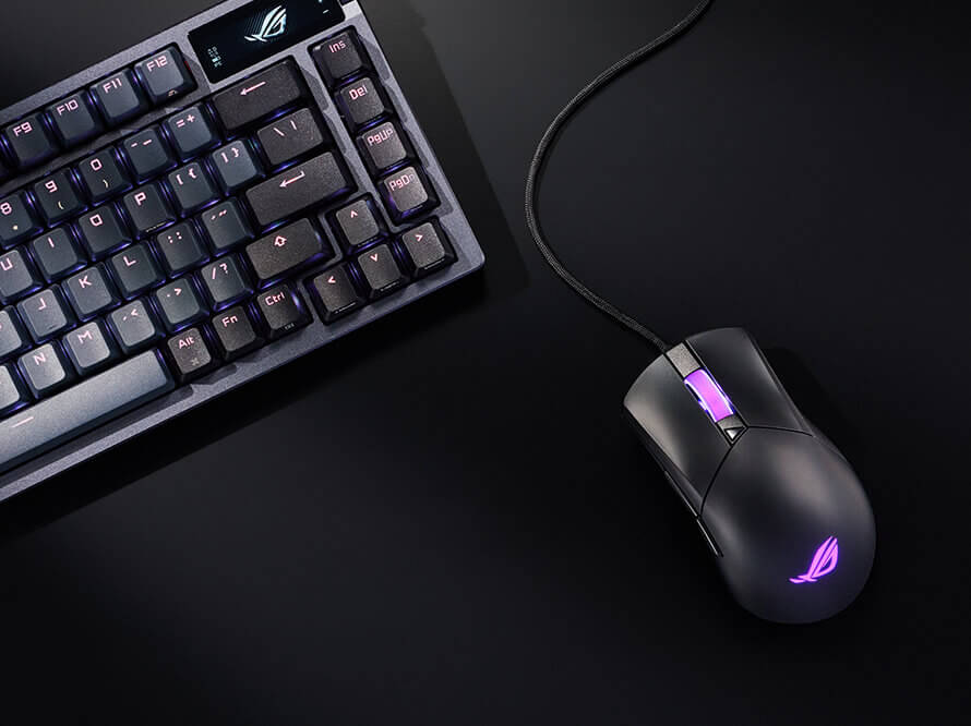  A top view of the ROG Gladius III Core mouse, placed next to the Azoth Keyboard