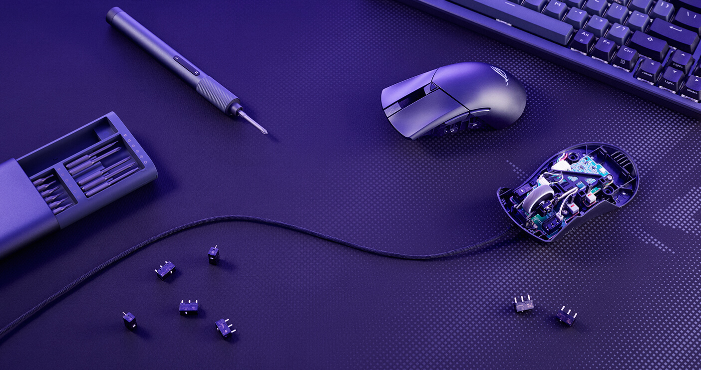 An image of the Gladius III Core opened up to showcase its push-fit switch socket, with five micro switches on the side and a screwdriver next to them.