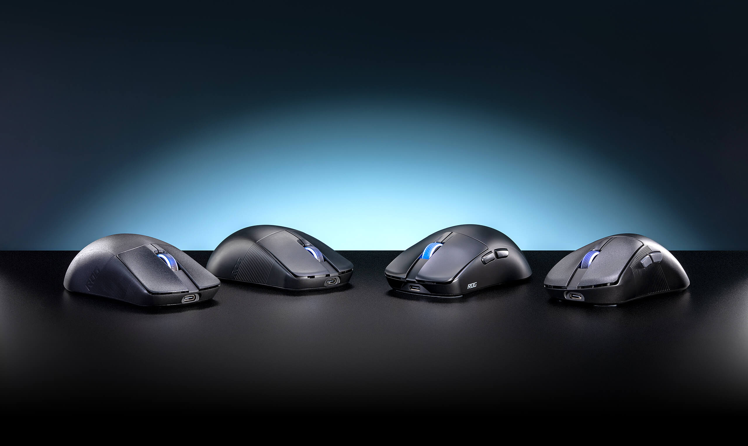 An image showcasing ROG Ace Esports gaming mice placed on a table top, including the Harpe Ace Aim Lab Edition, Harpe Ace Mini, Harpe II Ace, Keris II Ace