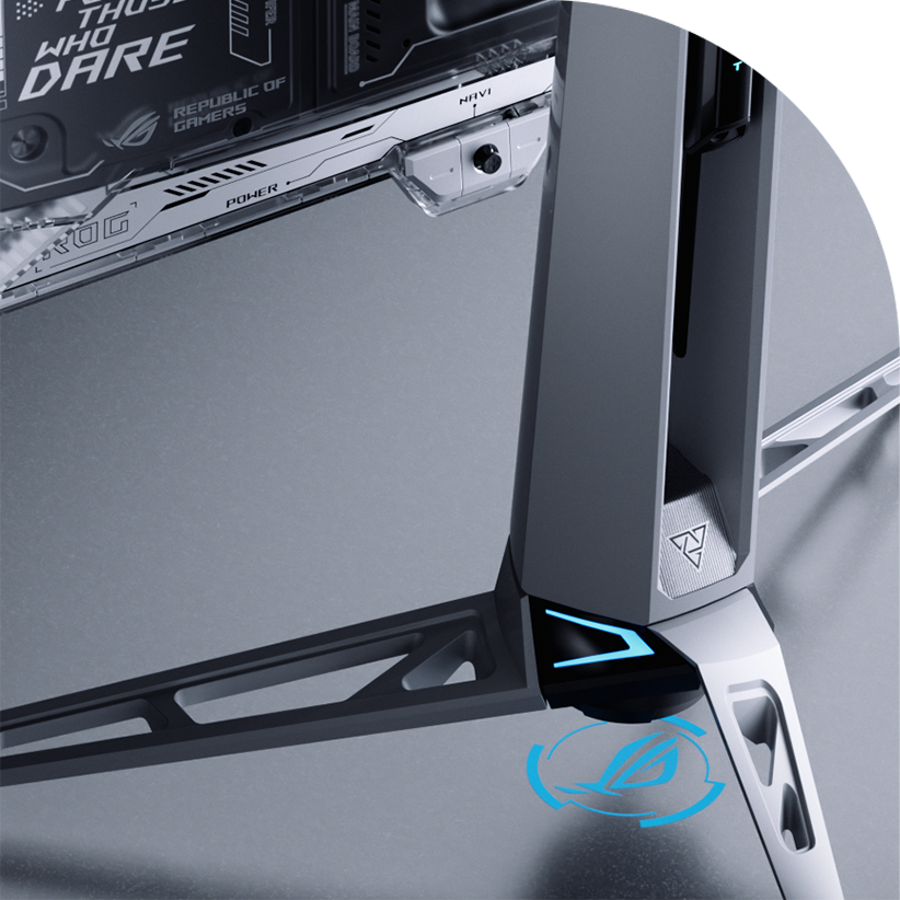 A close-up of the base of a ROG OLED monitor, showcasing its futuristic design with a silver and gray color scheme, angular structure, and blue LED accents