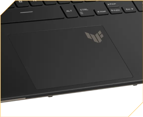 A close-up of a laptop touchpad with a TUF logo on it.
