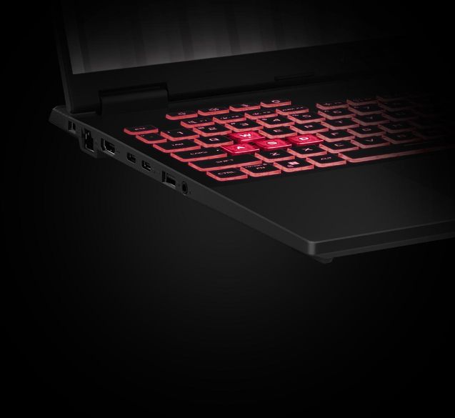 A TUF Gaming A16 with the TUF Gaming logo on screen, fully folded down to 180° to accentuate the hinge actuation range.