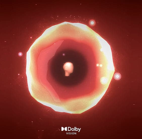 A stylized orange object floating on a black background, with the words “Dolby Atmos” written underneath.