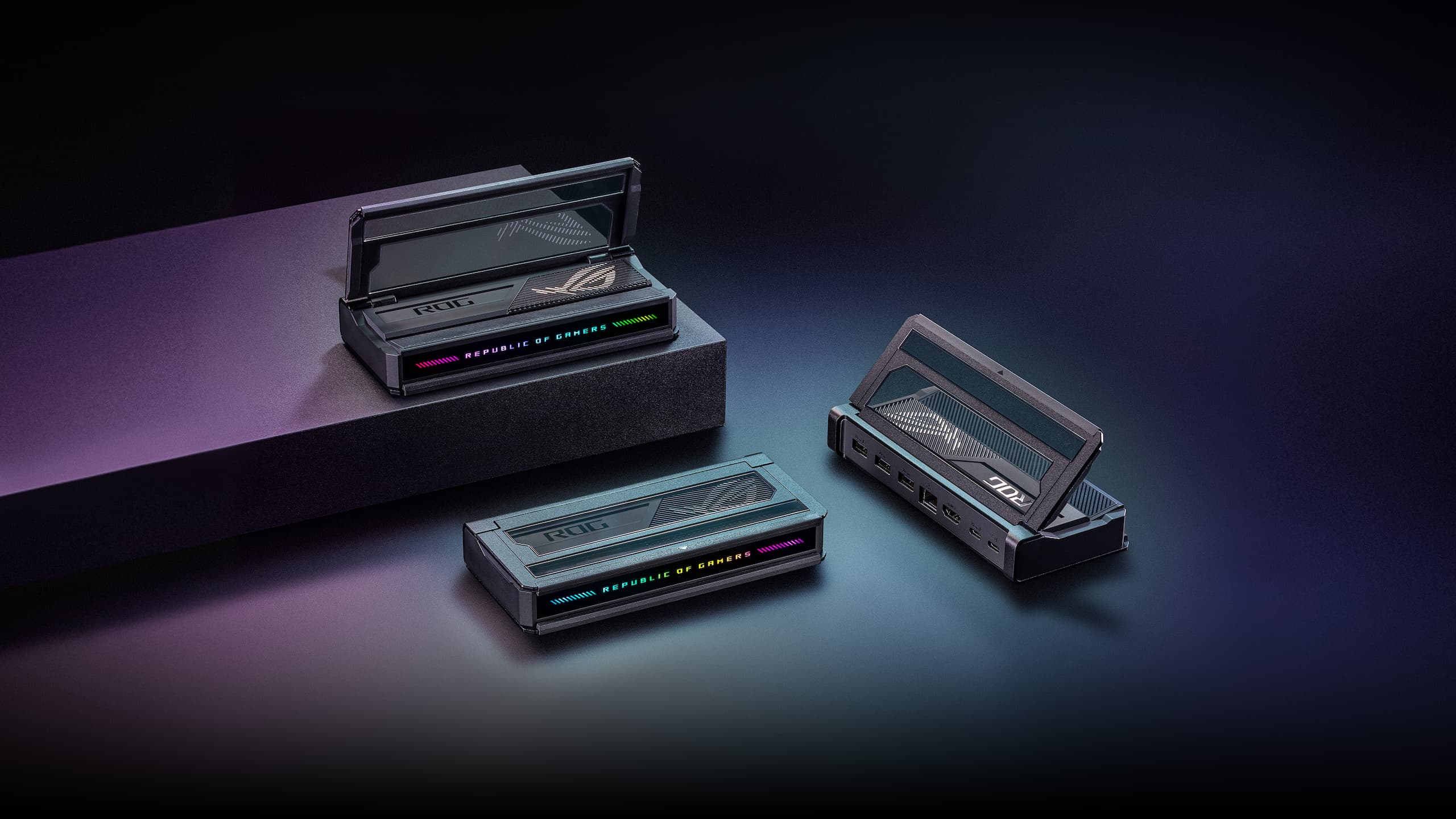 Three product images of the dock shown in different angles, illuminated with RGB lighting on a dark purple gradient background. Large product name "ROG Bulwark DG300 7-in-1 Dock" displayed beneath, followed by a brief tagline in small text.