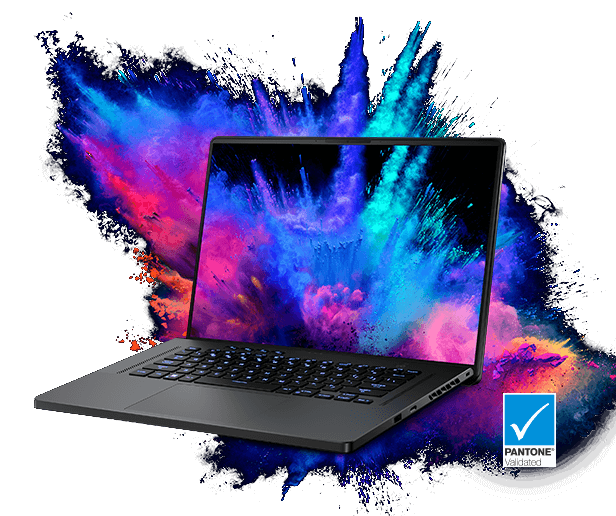 Colorful powder explosion, happening both on screen and behind the laptop.