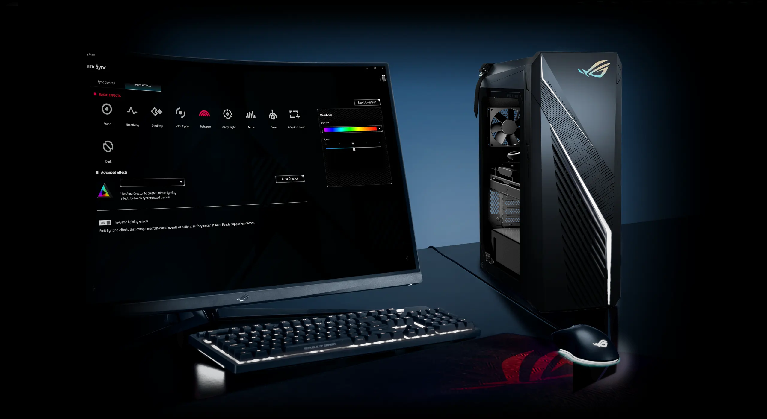 The ROG G16 sitting on a desk next to a gaming monitor, keyboard, and mouse.