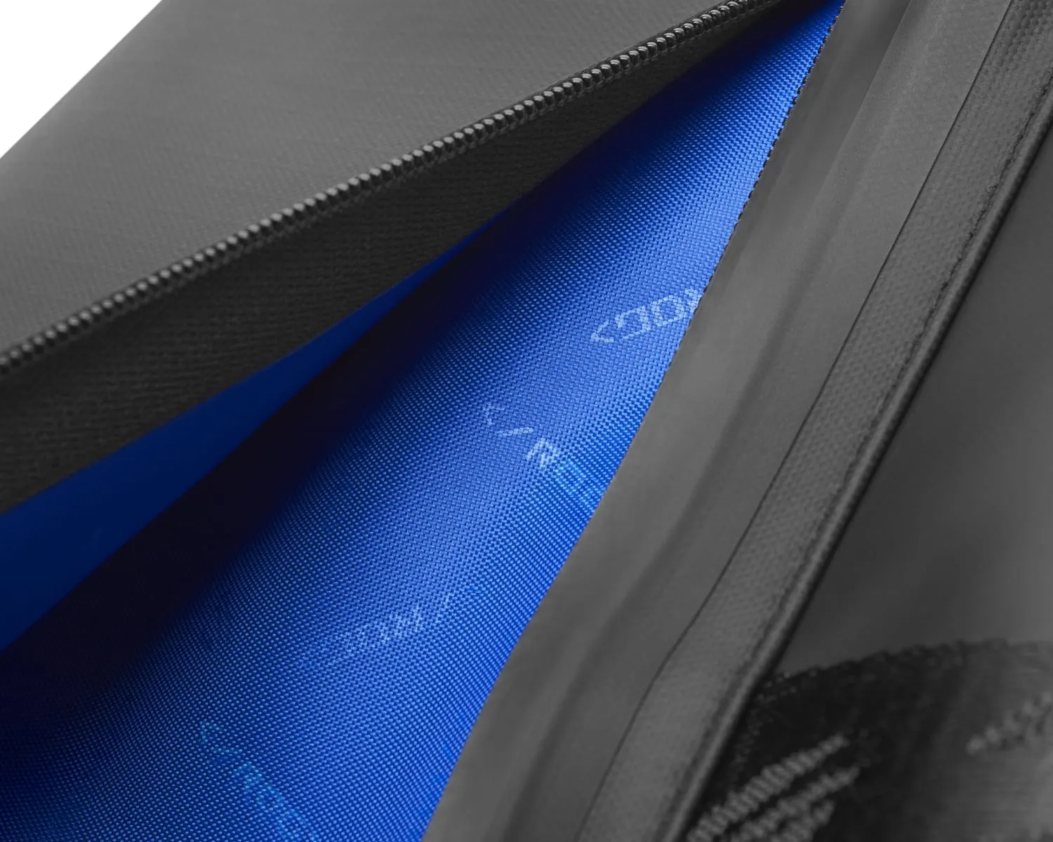 Extreme close-up of the interior stitching with the zipper opened on the ROG SLASH Sling Bag 2.0