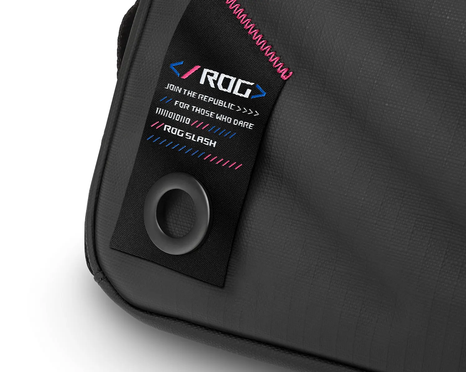 An extreme close-up of the stitching and detail of the ROG logo on the ROG SLASH Sleeve Bag 4.0.