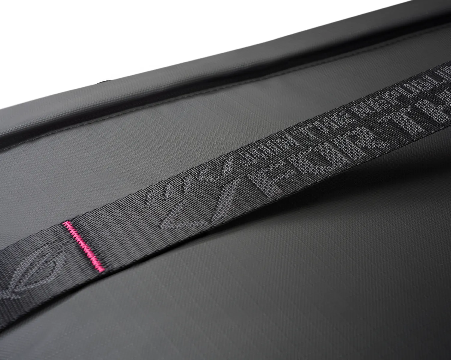 An extreme close-up of the detailing on the shoulder strap of the ROG SLASH Sleeve Bag 4.0.