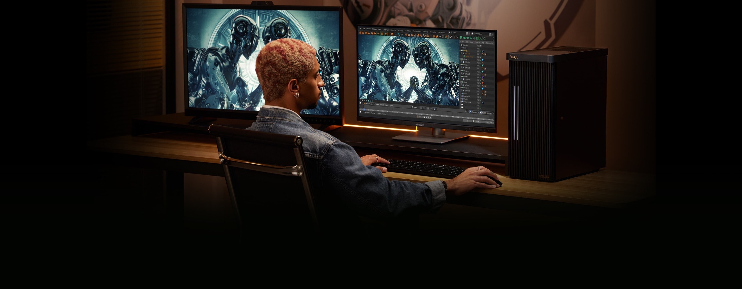 An image of a man sitting in front of desk with ProArt monitor, ProArt station, keyboard and mouse on it, using the creator software.