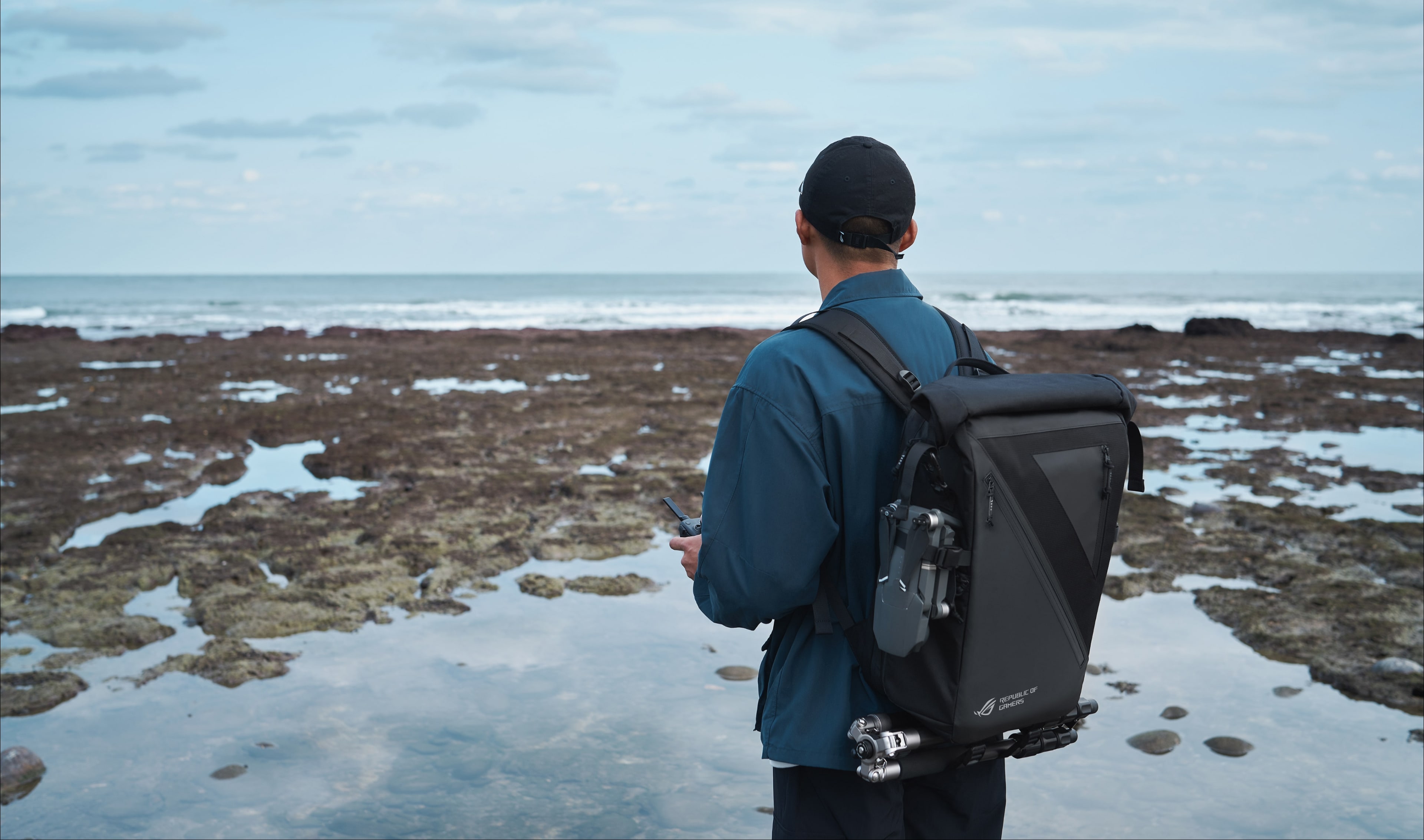 The image shows that a man wants to get the perfect shot on beach