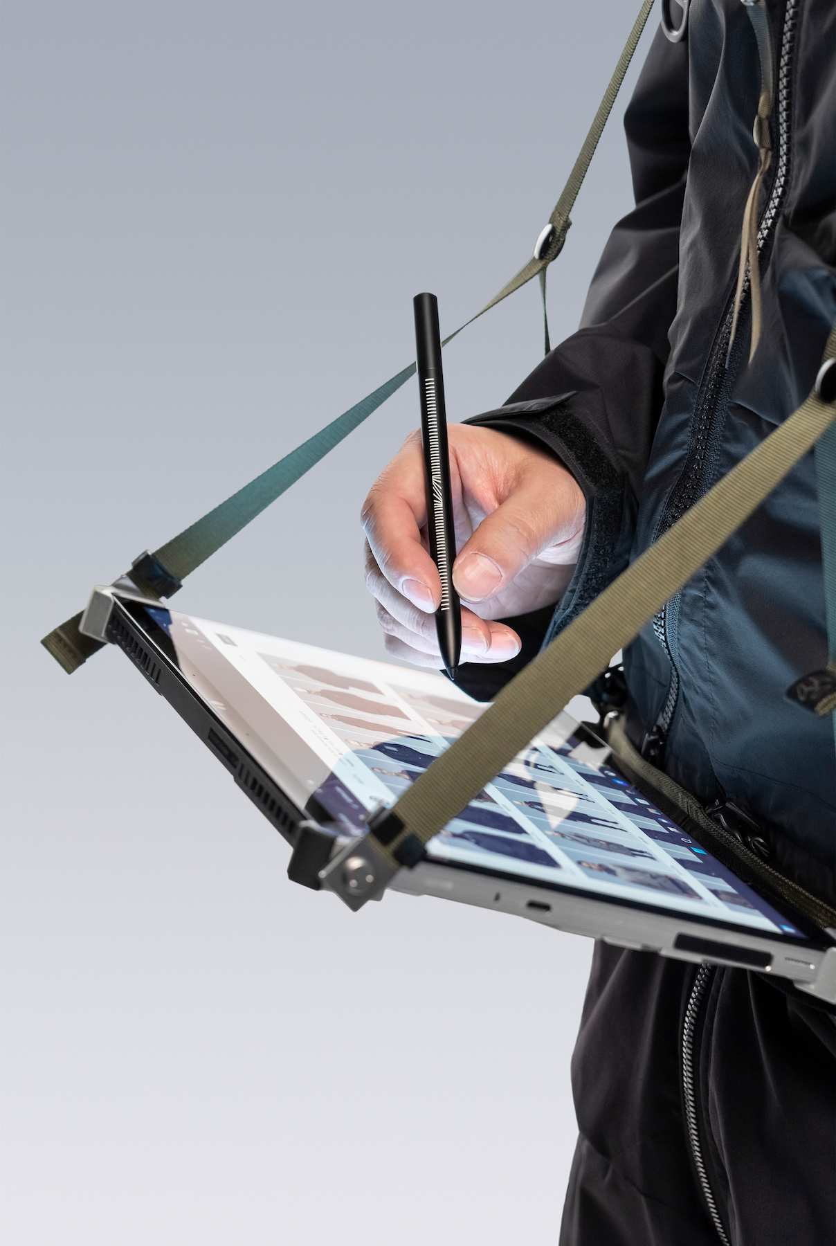 A close-up shot of Errolson Hugh using the RMT02 in producer mode with a stylus.