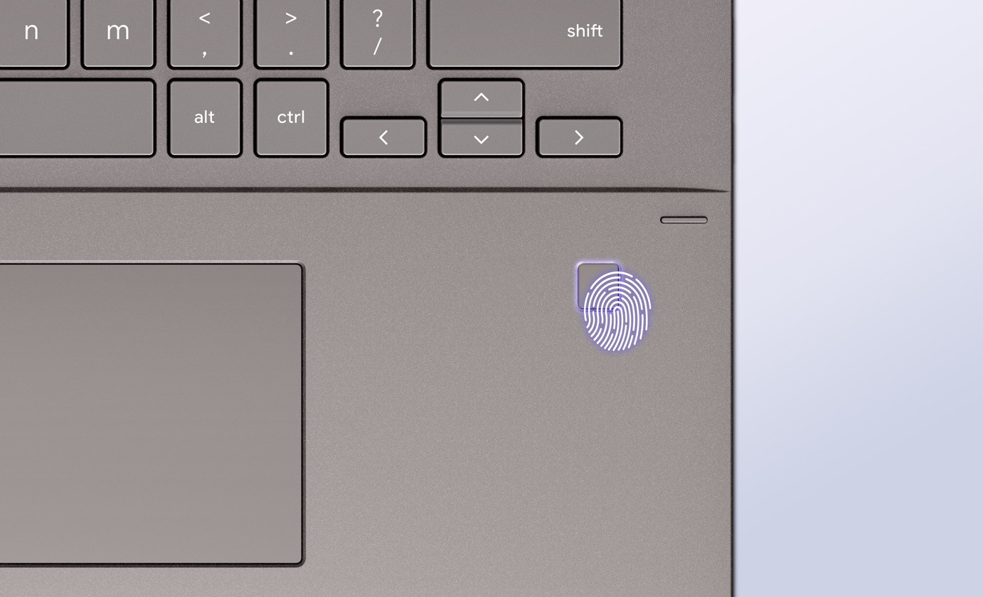 An overhead, close-up view of ASUS Chromebook Plus CM34 Flip’s fingerprint sensor. 