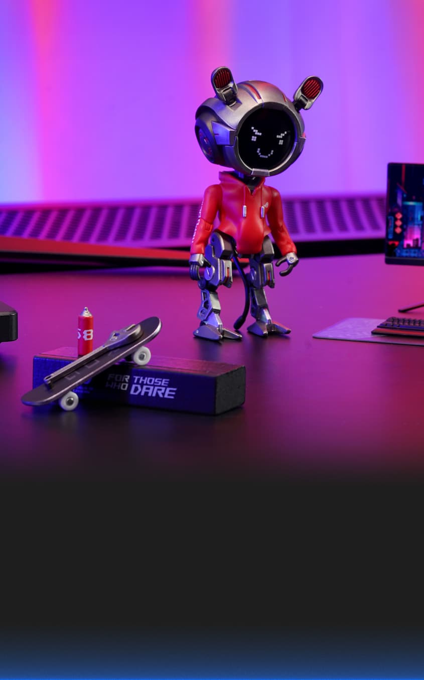 The figure is posed standing confidently on a gaming desk, next to a mini skateboard, a spray can, and ROG-branded accessories. The background features a colorful neon-lit gaming setup. The scene is paired with the quote “I GO WHERE THE ACTION IS. AND THAT'S HERE.” This image highlights OMNI Model OG's bold personality and stylish presence, making it an appealing gaming companion and premium collectible.