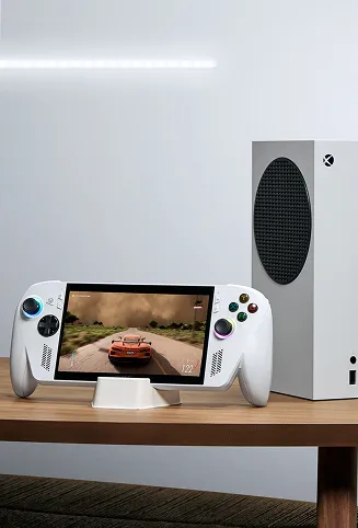 An ROG Xbox Ally sitting alongside the Xbox Series S console, with a game on screen.