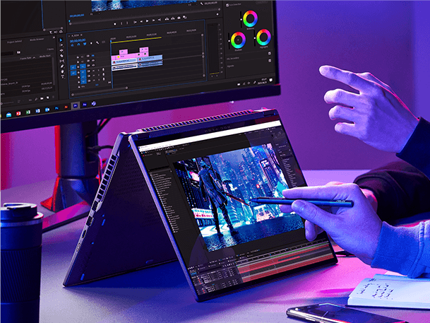 Graphic designer using design software with a stylus on ROG Flow X16 laptop 