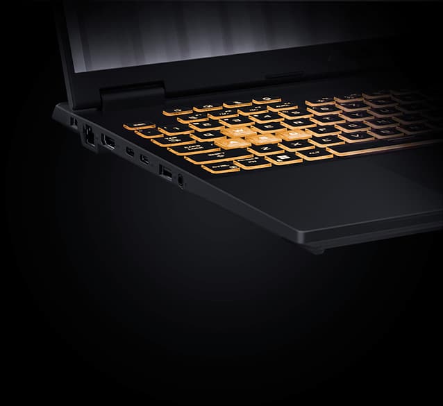 A TUF Gaming F16 with the TUF Gaming logo on screen, fully folded down to 180° to accentuate the hinge actuation range.