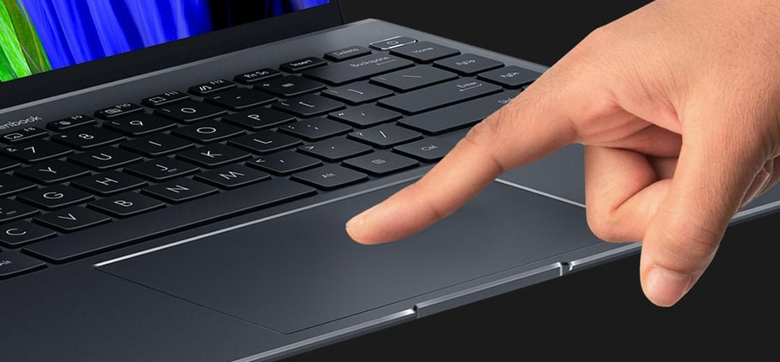 A finger scrolls on the ultra-smooth surface of the ErgoSense touchpad.