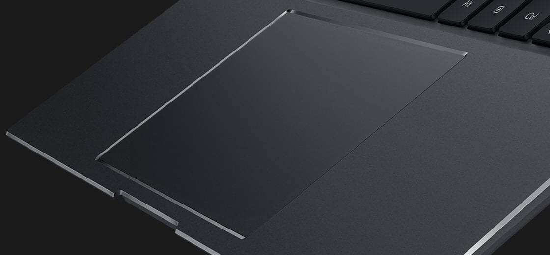 XX view [Note: customizable] of a smudge-free ErgoSense touchpad with anti-fingerprint coating.