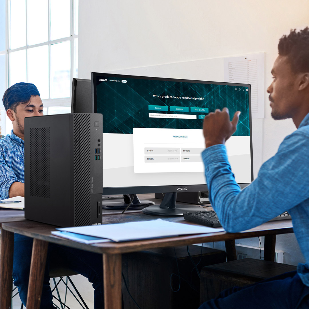 It's an office and one of the workers is using ASUS ExpertCenter desktop for work