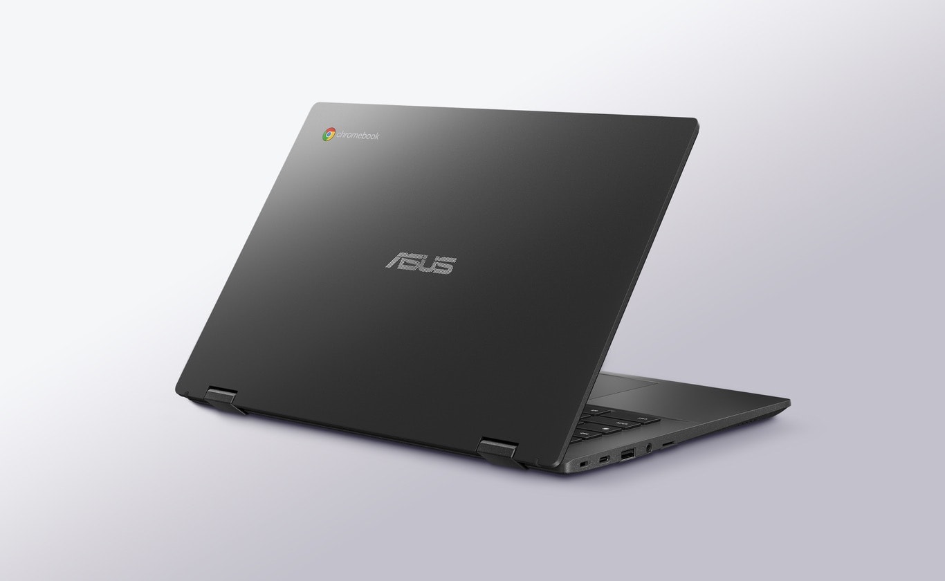 An angled rear view of an ASUS Chromebook CM14 Flip in laptop mode showing the transparent silver chassis. 