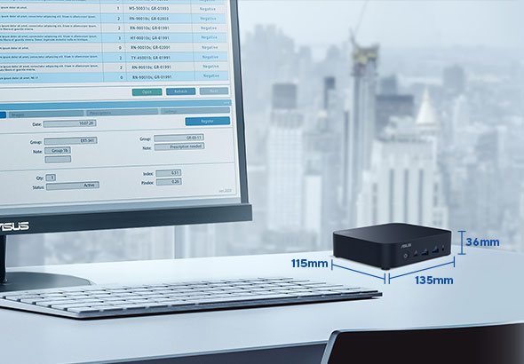 A desk with an ASUS monitor, a keyboard, and a NUC 14 Essential, set against a backdrop of skyscrapers.